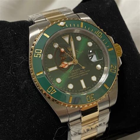 rolex submariner grün gold